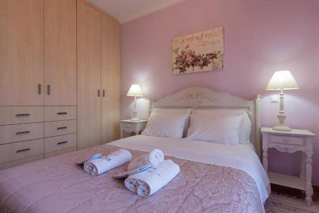 Posteľ alebo postele v izbe v ubytovaní Nautilus Luxury Suites