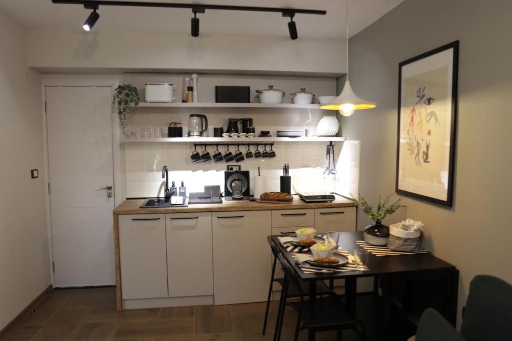 Virtuvė arba virtuvėlė apgyvendinimo įstaigoje Vista Apartmani