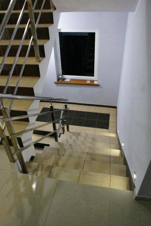 Televízia a/alebo spoločenská miestnosť v ubytovaní Pokoje Gościnne Anastazja