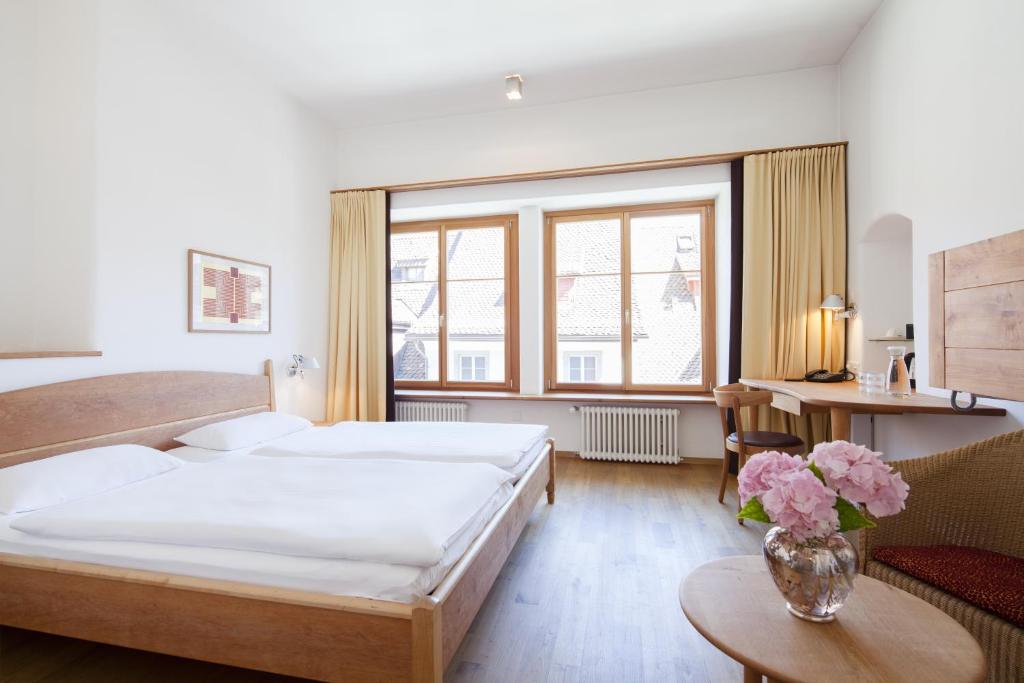 Postel nebo postele na pokoji v ubytování City-Hotel Ochsen