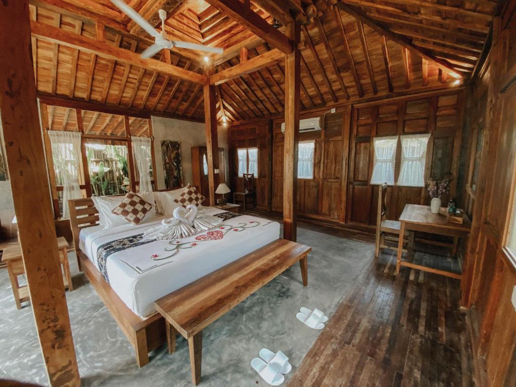 Postel nebo postele na pokoji v ubytování Sarini Villas