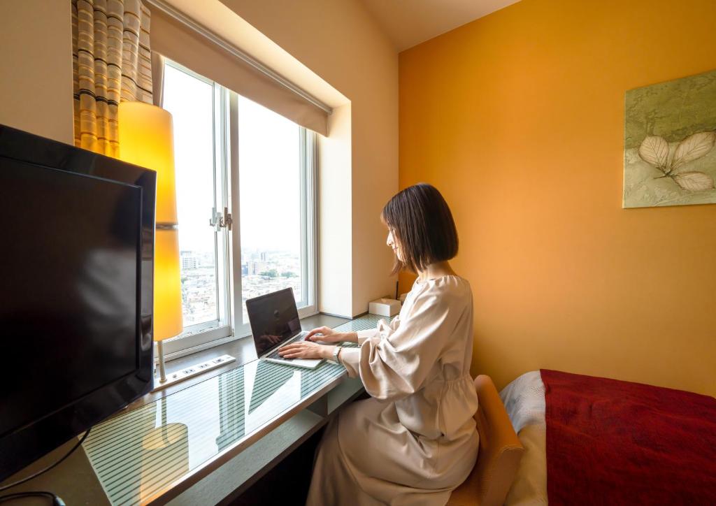 アワーズイン阪急にあるテレビまたはエンターテインメントセンター