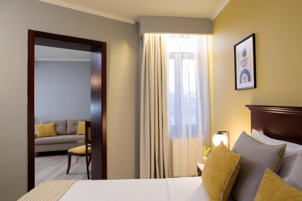 Postel nebo postele na pokoji v ubytování Hotel Venezia by Zeus International
