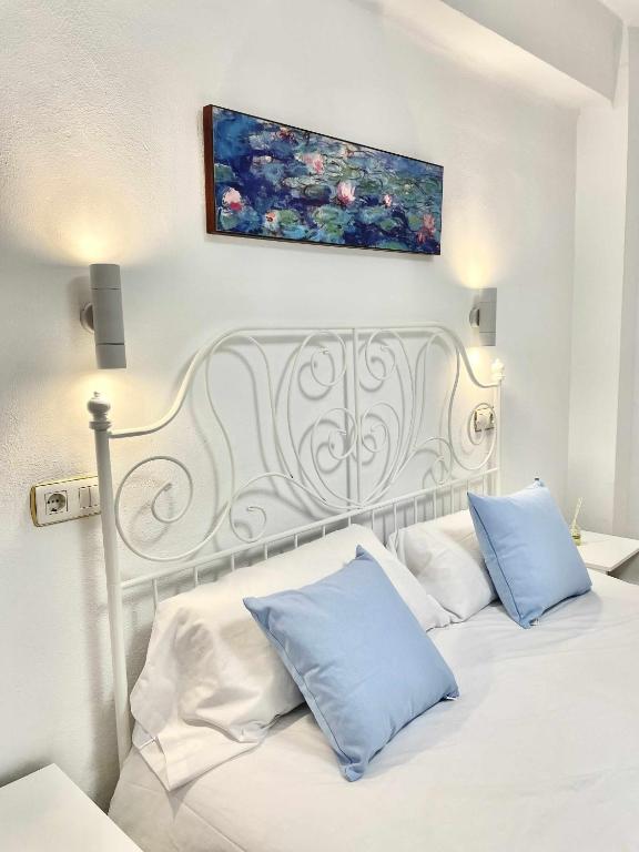Posteľ alebo postele v izbe v ubytovaní Apartamento en el centro de Malaga, en el Soho