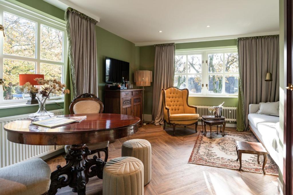 Posezení v ubytování Boetiekhotel De Kastanjehof