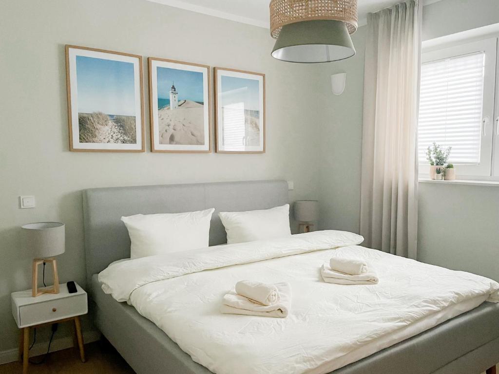 Postel nebo postele na pokoji v ubytování Ferienwohnung Swedish Summer