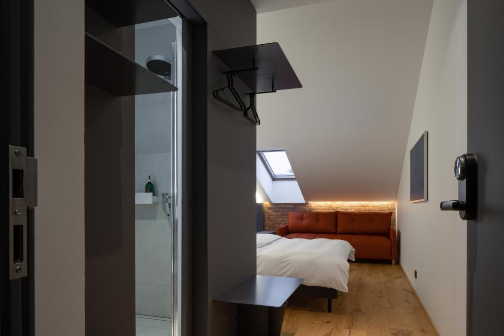 Postel nebo postele na pokoji v ubytování Dunten Hotel
