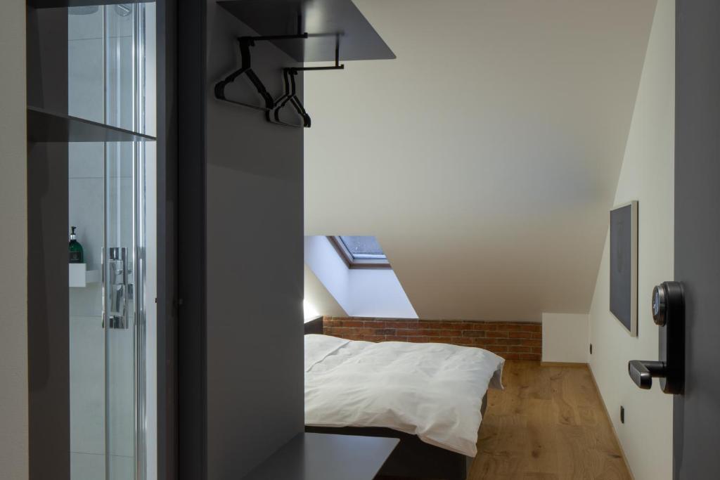 Postel nebo postele na pokoji v ubytování Dunten Hotel