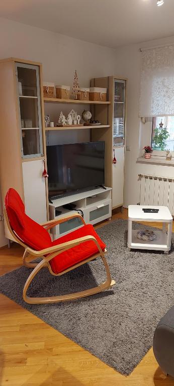 Televízia a/alebo spoločenská miestnosť v ubytovaní Apartment 40