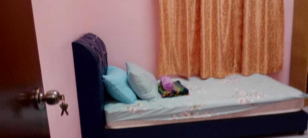 Postel nebo postele na pokoji v ubytování Qaseh Aishah