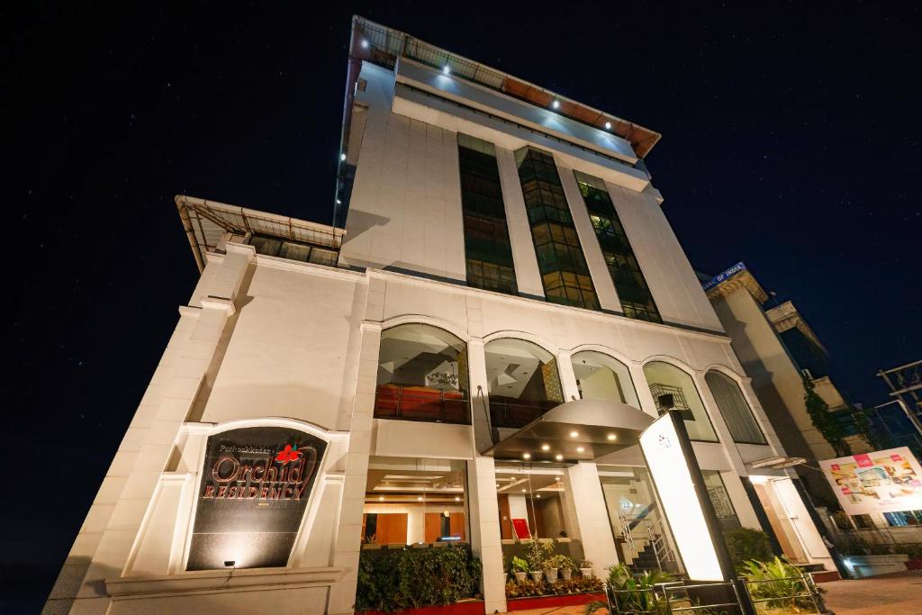 Orchid Residency by Magnum Hotels - Housity