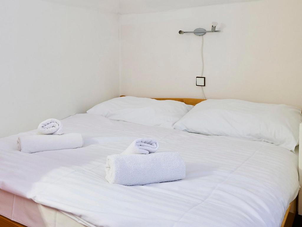 Łóżko lub łóżka w pokoju w obiekcie Apartment Klondajk by Interhome