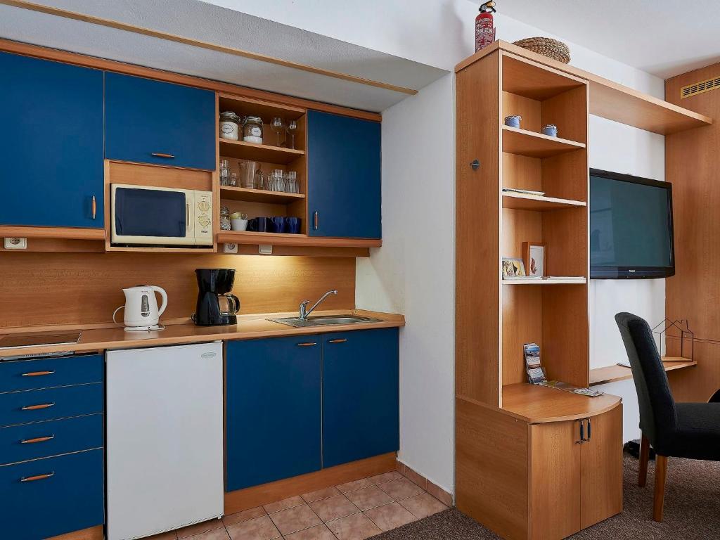 Kuchyň nebo kuchyňský kout v ubytování Apartment Harrachovka by Interhome