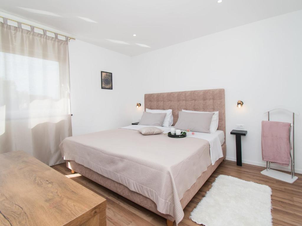 Postel nebo postele na pokoji v ubytování Holiday Home Villa Nika by Interhome