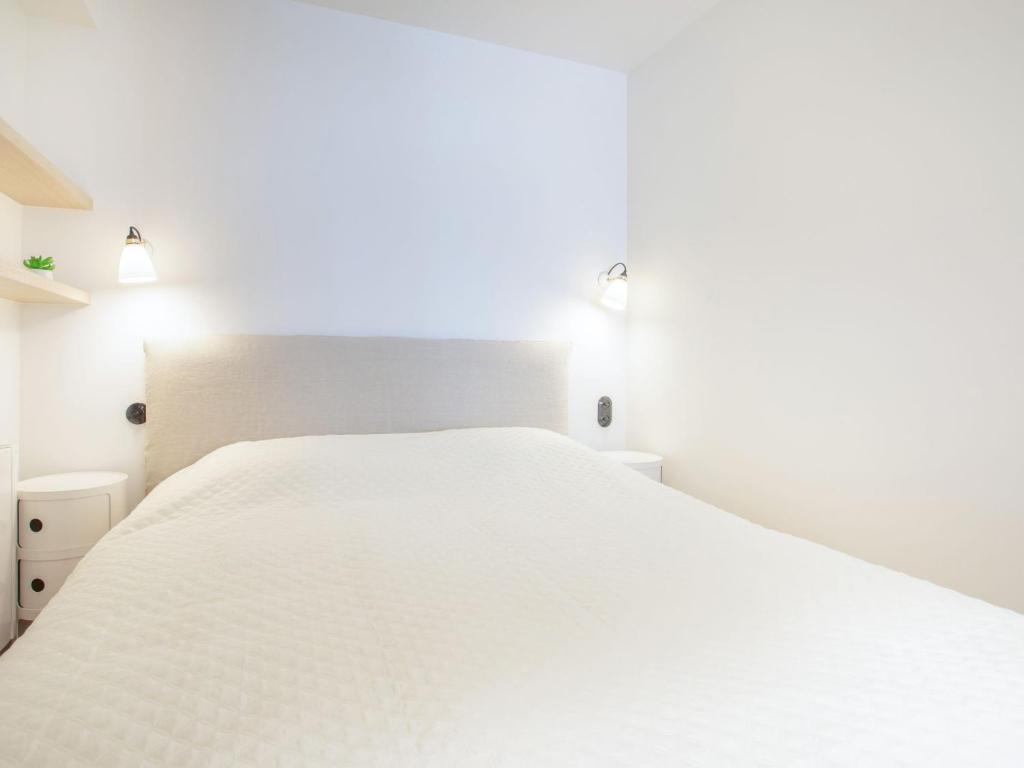 Postel nebo postele na pokoji v ubytování Apartment Winston by Interhome