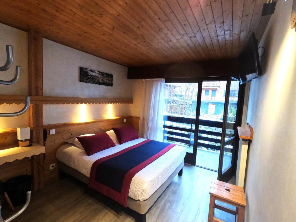Postel nebo postele na pokoji v ubytování Hotel Le Soly