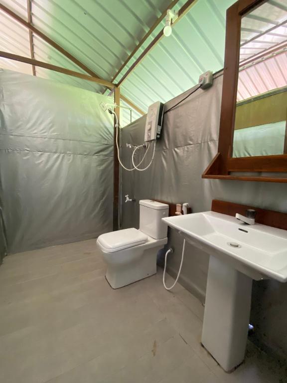 Koupelna v ubytování mango villa wilpattu
