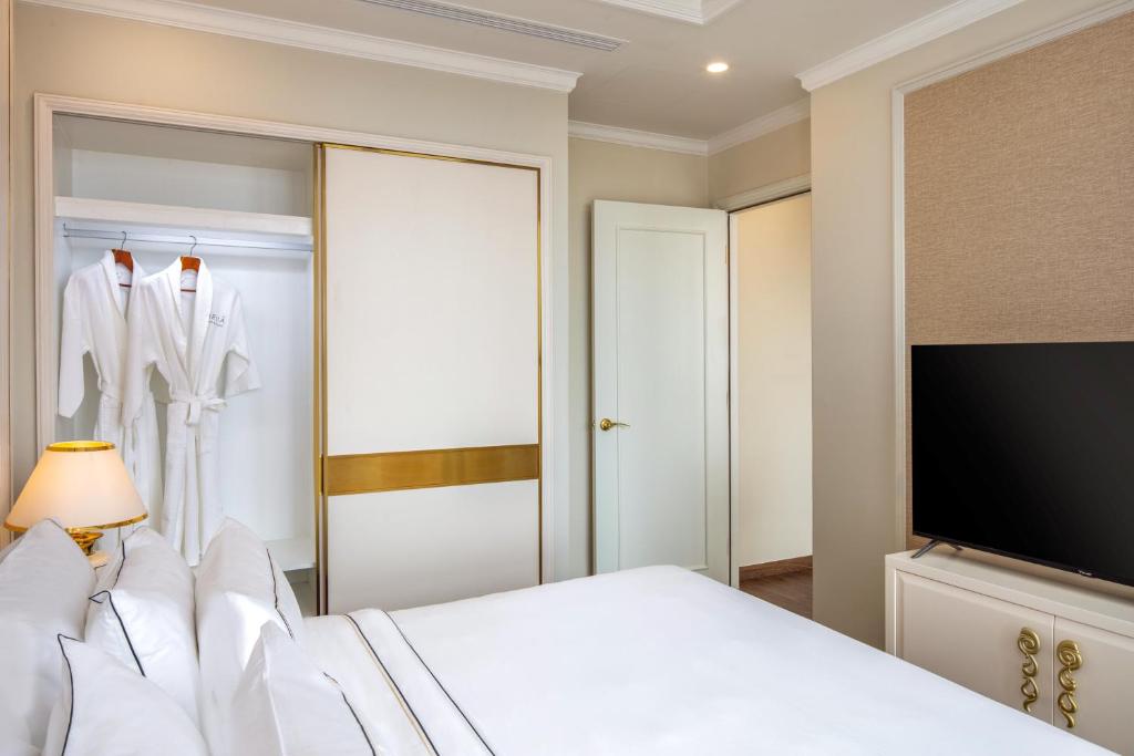 Giường trong phòng chung tại Meliá Vinpearl Nha Trang Empire