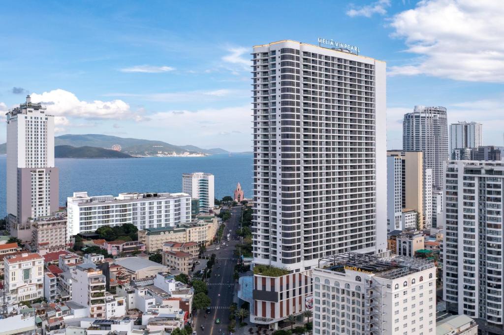 a view of a city with a tall building at Meliá Vinpearl Nha Trang Empire in Nha Trang