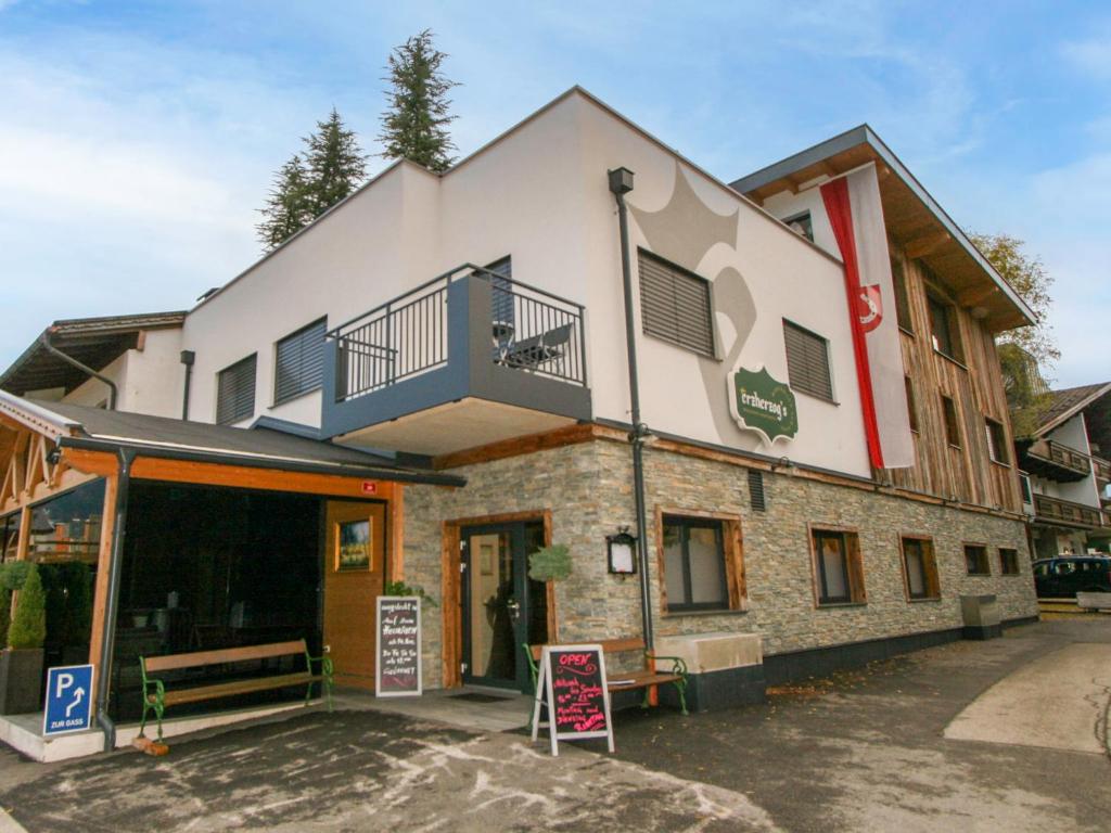 a building with a sign in front of it at Apartment Erzherzog's Apts-Zillertal Alpen Lodge by Interhome in Uderns