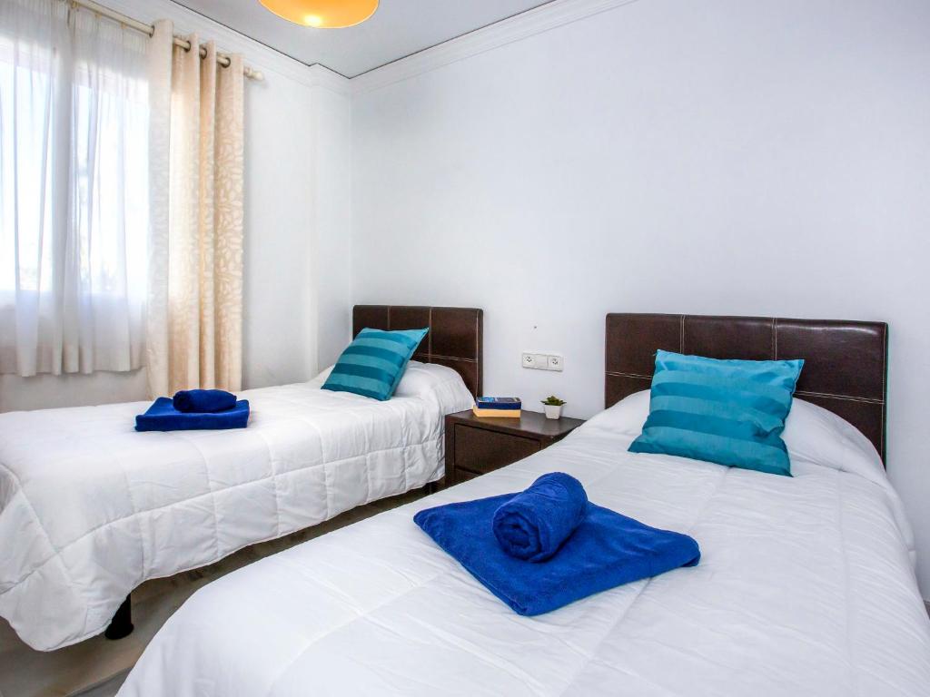 Postel nebo postele na pokoji v ubytování Apartment L'Alberca-1 by Interhome