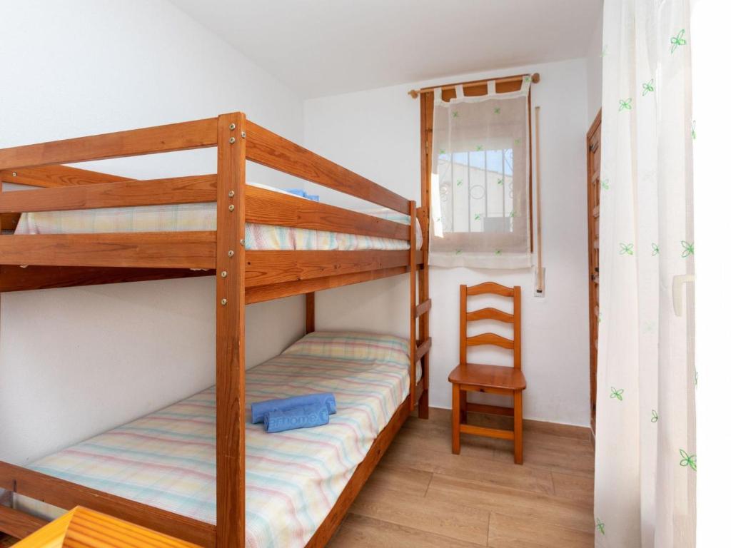 Postel nebo postele na pokoji v ubytování Villa Villa Tres Calas 3 by Interhome