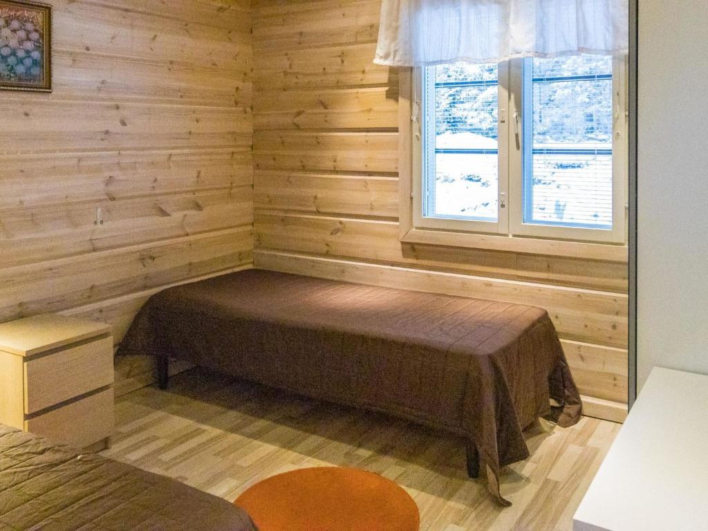Postel nebo postele na pokoji v ubytování Holiday Home Pyhänkarhu 3 by Interhome