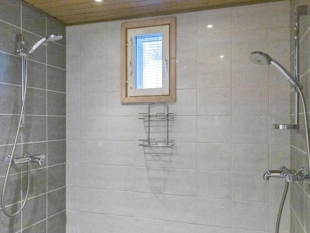 Koupelna v ubytování Holiday Home Pyhänkarhu 3 by Interhome