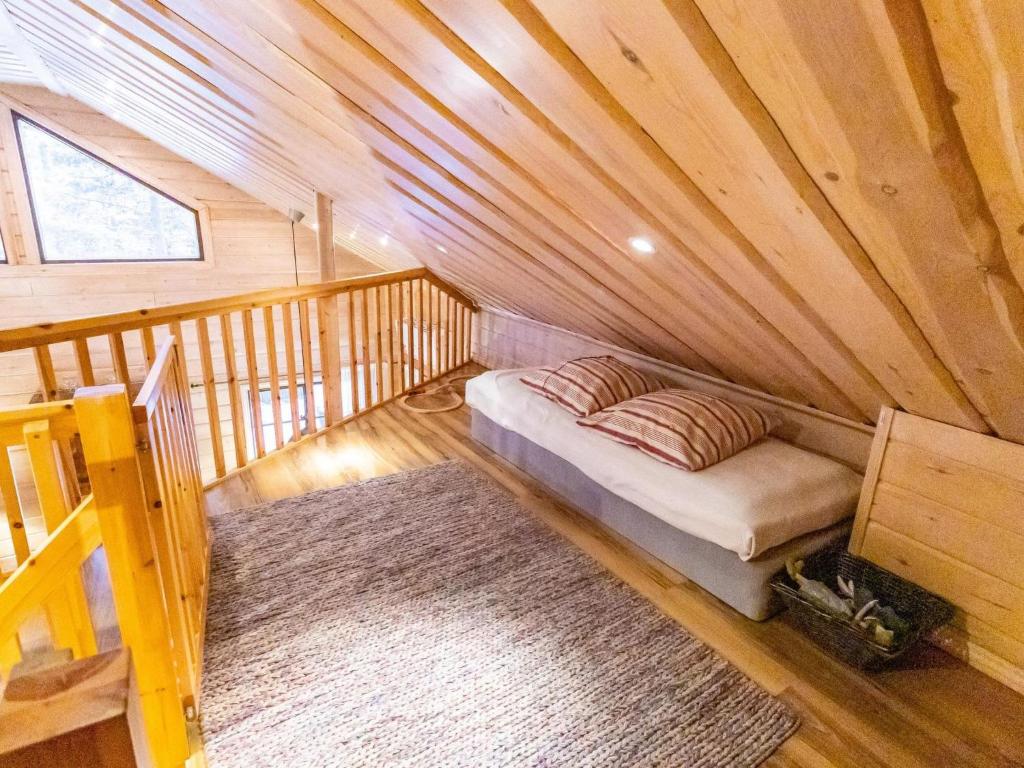 Postel nebo postele na pokoji v ubytování Holiday Home Pyhänkarhu 1 by Interhome
