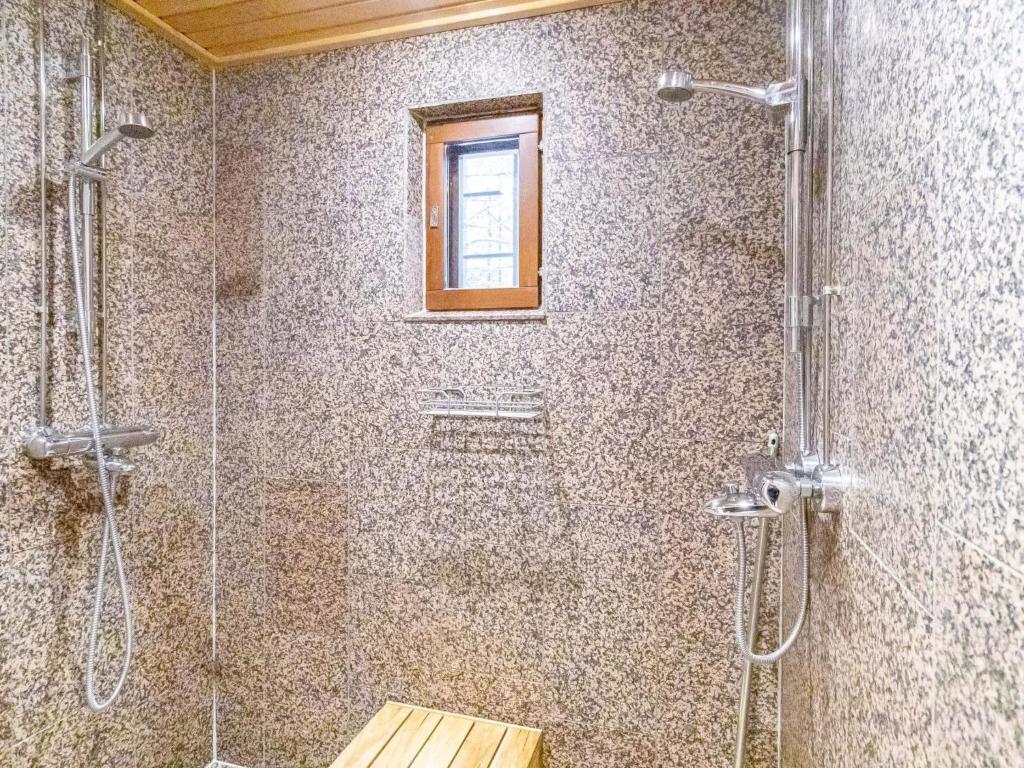 Koupelna v ubytování Holiday Home Pyhänkarhu 1 by Interhome