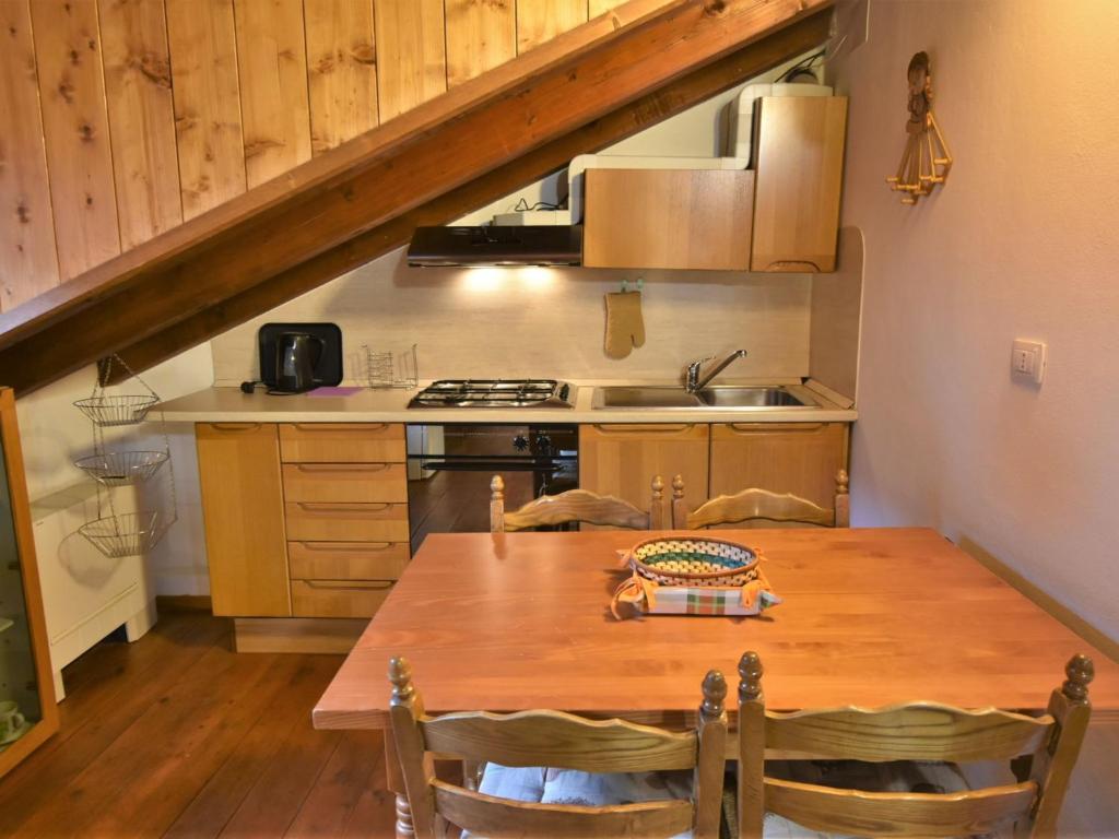 A kitchen or kitchenette at Studio Albergo Diffuso - Cjasa de Pagnocca by Interhome