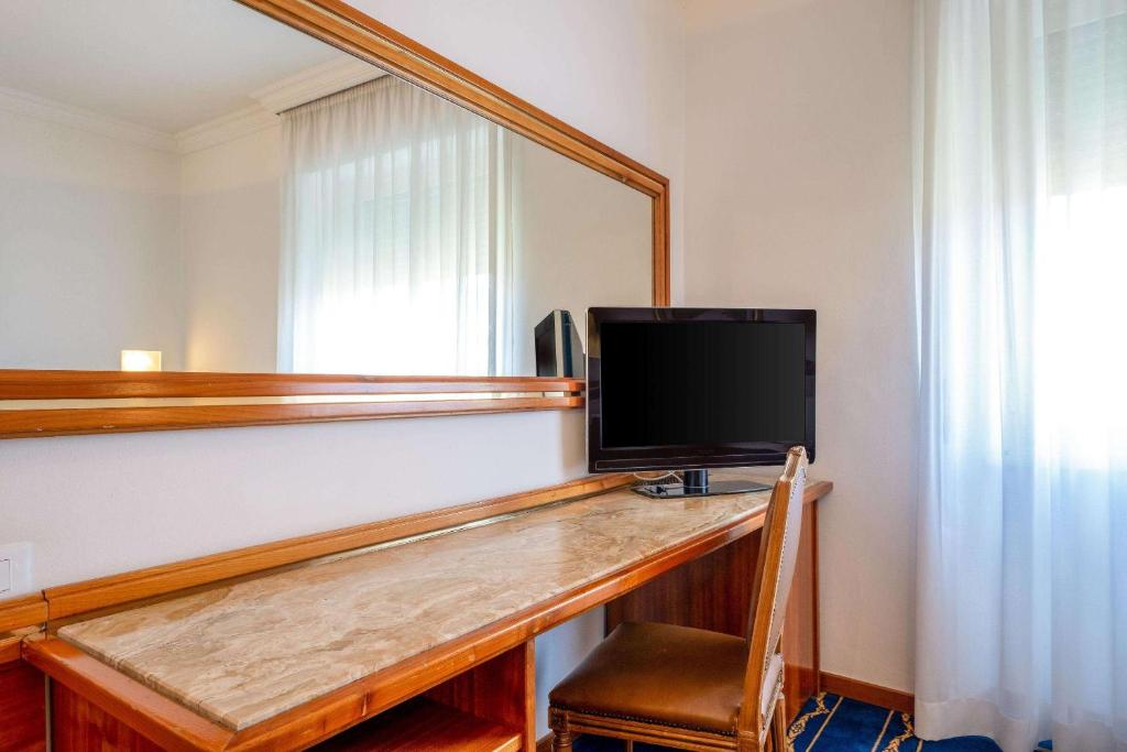 TV a/nebo společenská místnost v ubytování Quality Hotel Nova Domus