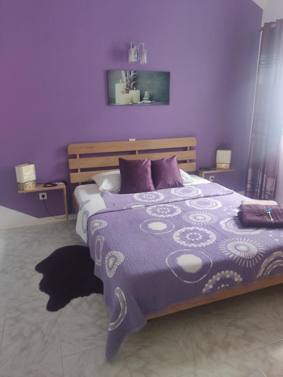 Postel nebo postele na pokoji v ubytování Maderalzinho