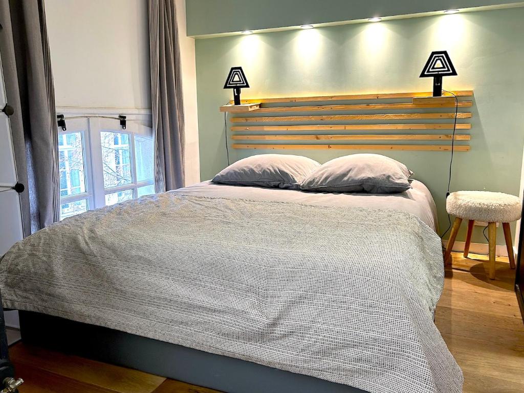Posteľ alebo postele v izbe v ubytovaní Loft Varenne