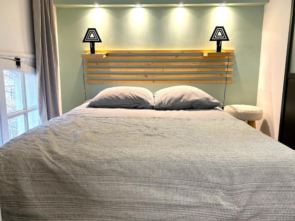 Posteľ alebo postele v izbe v ubytovaní Loft Varenne