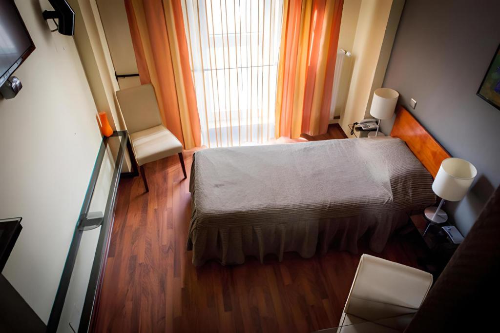 Postel nebo postele na pokoji v ubytování Tania-Frankfurt Hotel