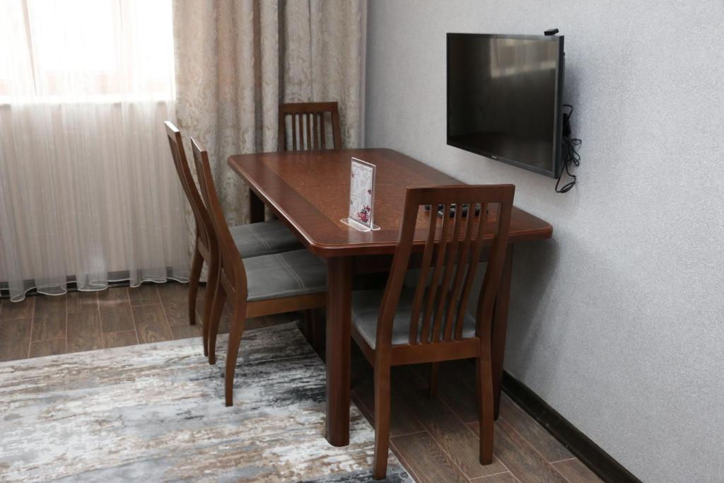 TV a/nebo společenská místnost v ubytování Classic Hotel