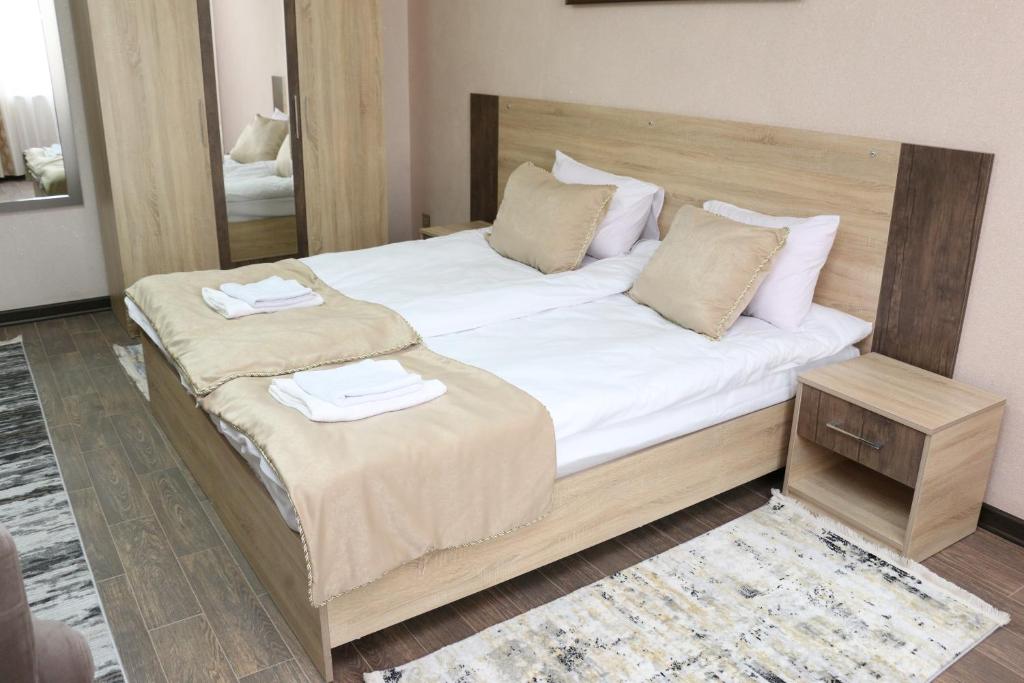 Postel nebo postele na pokoji v ubytování Classic Hotel