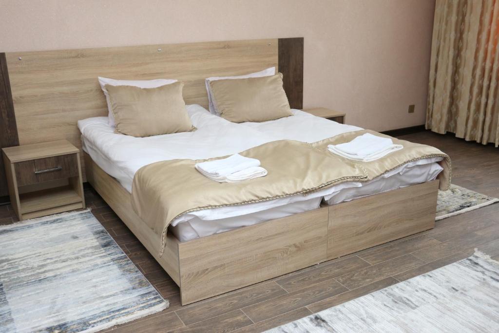 Postel nebo postele na pokoji v ubytování Classic Hotel