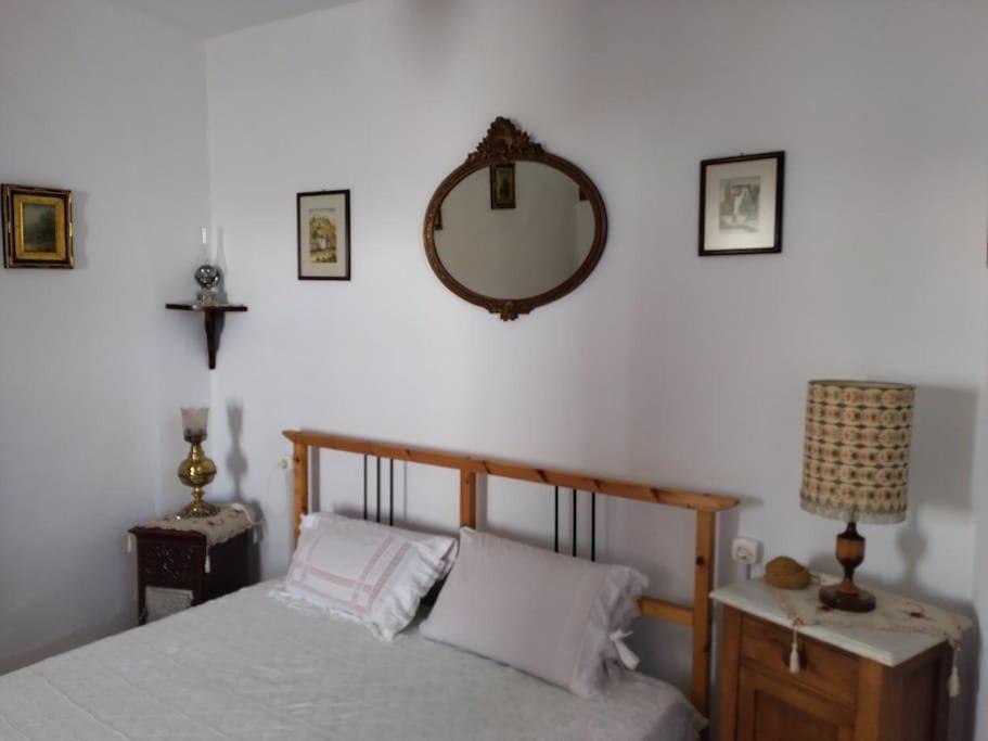 Posteľ alebo postele v izbe v ubytovaní Athena's Guest House