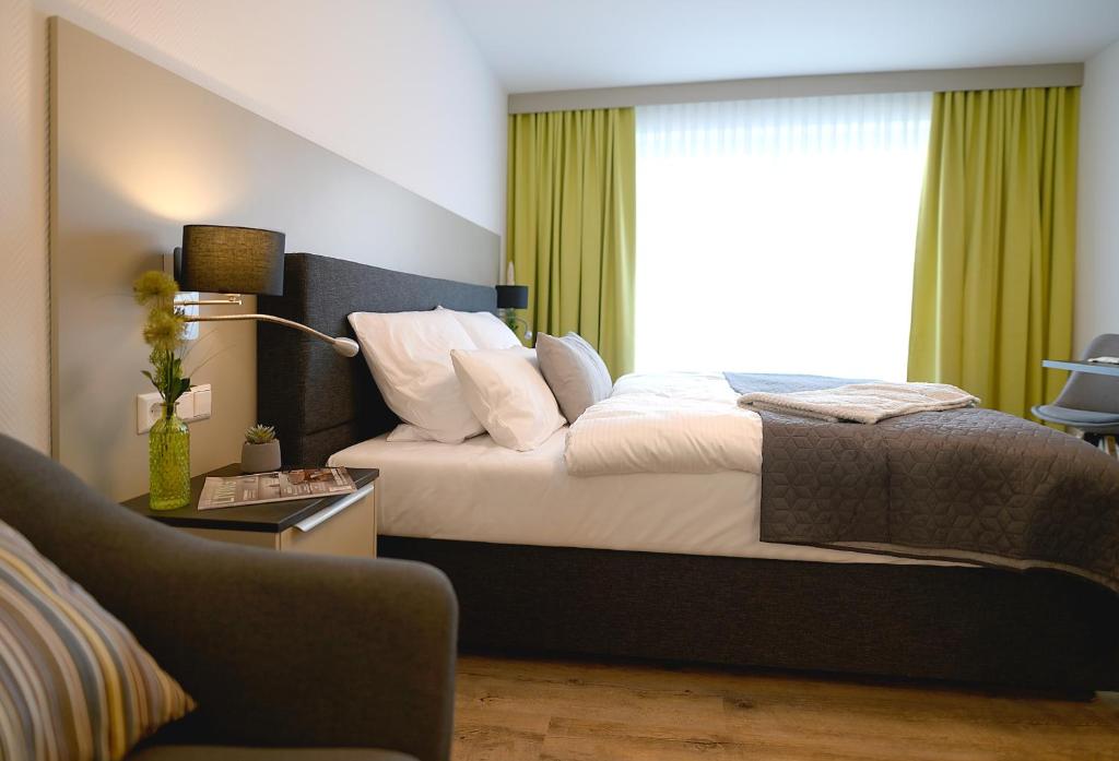 Postel nebo postele na pokoji v ubytování Gandersheimer Boardinghouse