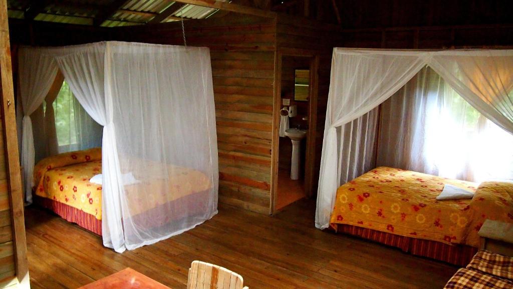 Postel nebo postele na pokoji v ubytování Hotel Wagelia Espino Blanco