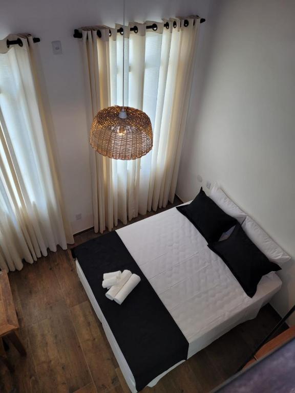 Postel nebo postele na pokoji v ubytování Pelourinho Boutique Hotel - OH HOTÉIS