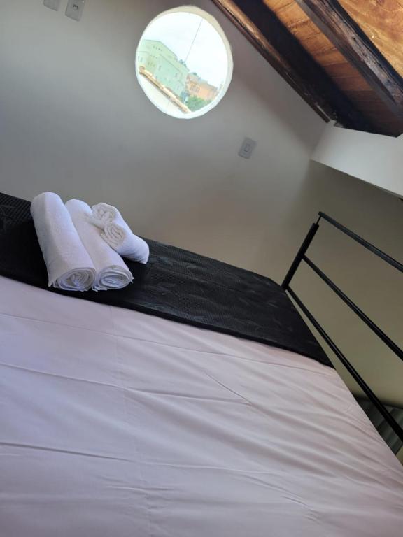Postel nebo postele na pokoji v ubytování Pelourinho Boutique Hotel - OH HOTÉIS