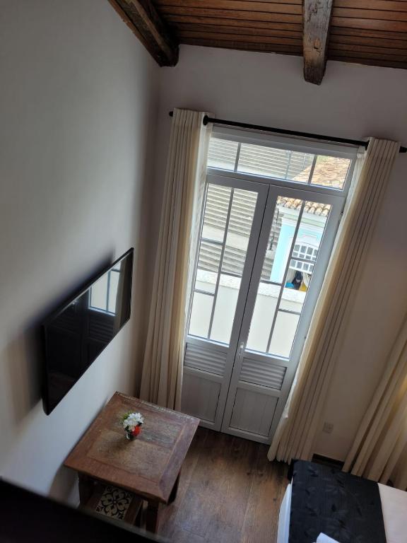 Postel nebo postele na pokoji v ubytování Pelourinho Boutique Hotel - OH HOTÉIS