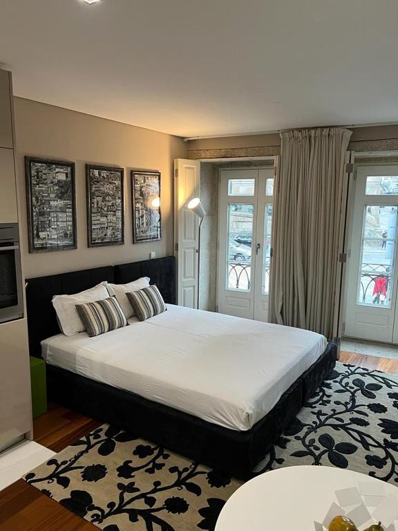 Postel nebo postele na pokoji v ubytování Oporto Chic & Cozy Cardosas