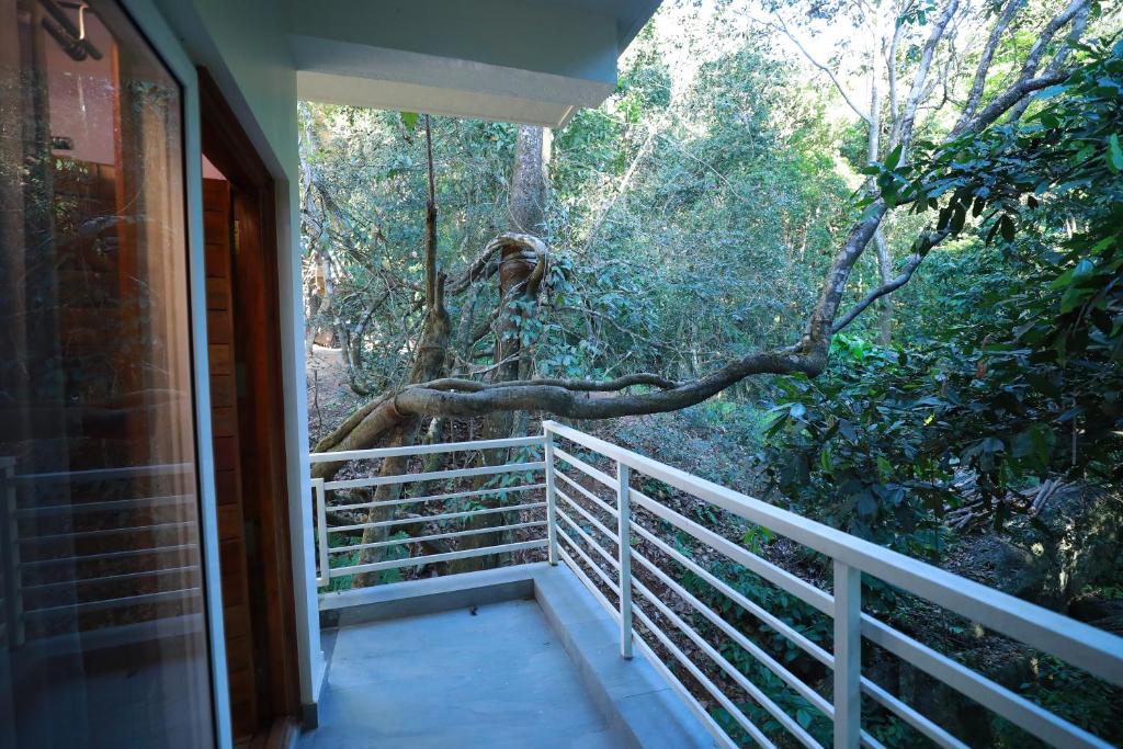 Balkón nebo terasa v ubytování Coorg Coffee Bean Resort