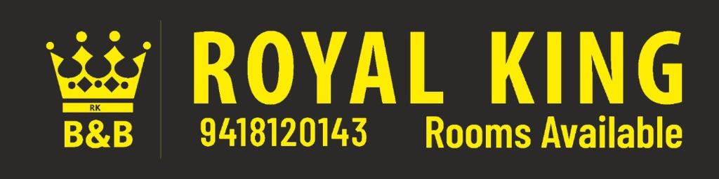 two yellow signs with the words royal king and rooms available at Royal king B&B in Shimla