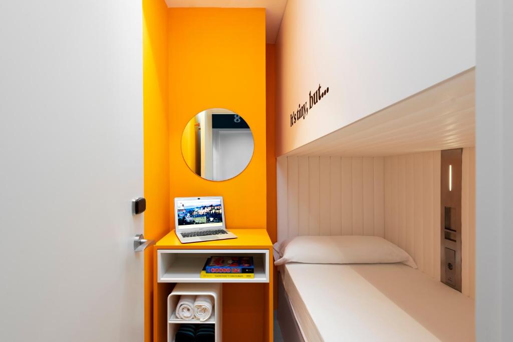 Postel nebo postele na pokoji v ubytování Coeo Pod Hostel Beatas