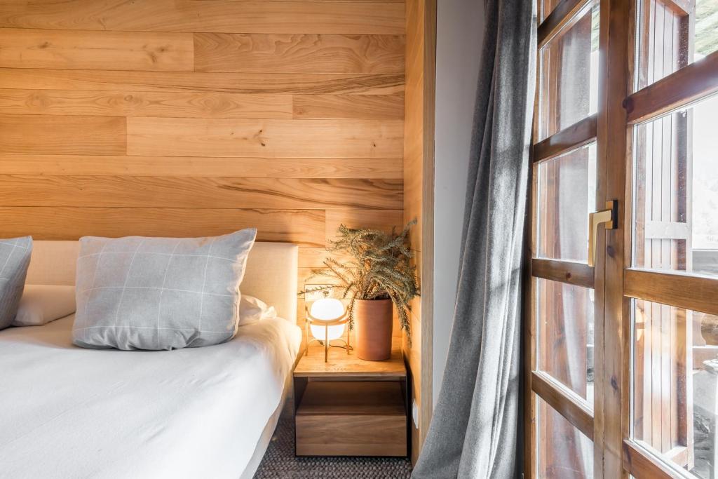 A bed or beds in a room at Muntanyos by Totiaran